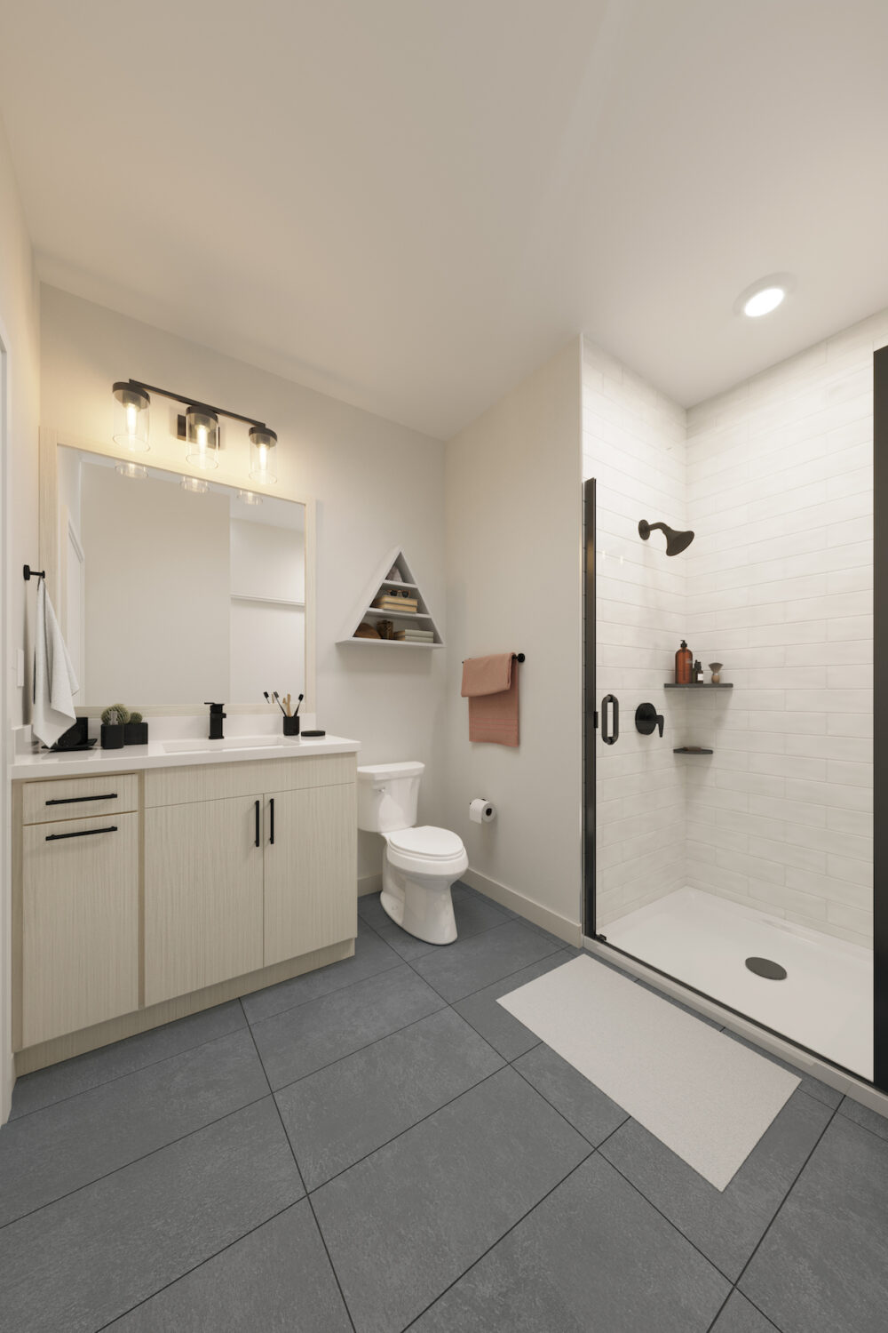 Bathroom with large walk-in shower, designer lighting, and single sink vanity